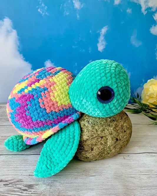 Peluche tortue géante Les mailles calines