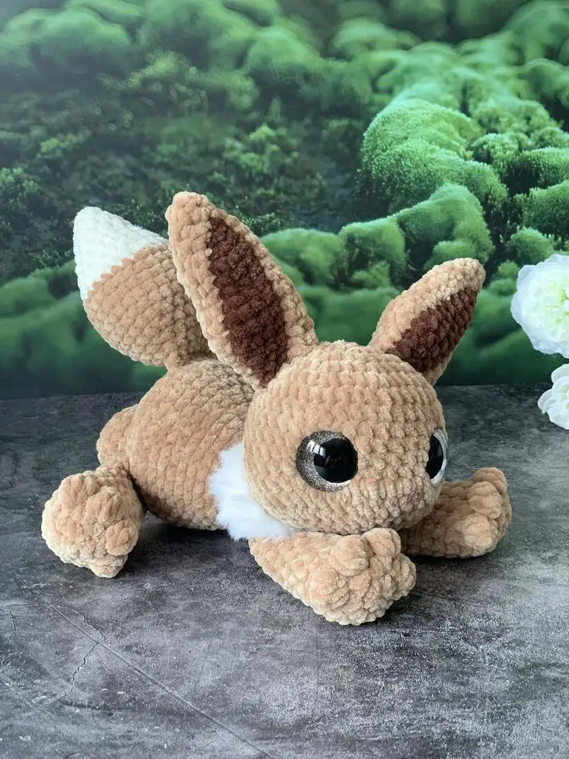 Peluche Pokemon (Grand Evoli) Les mailles calines