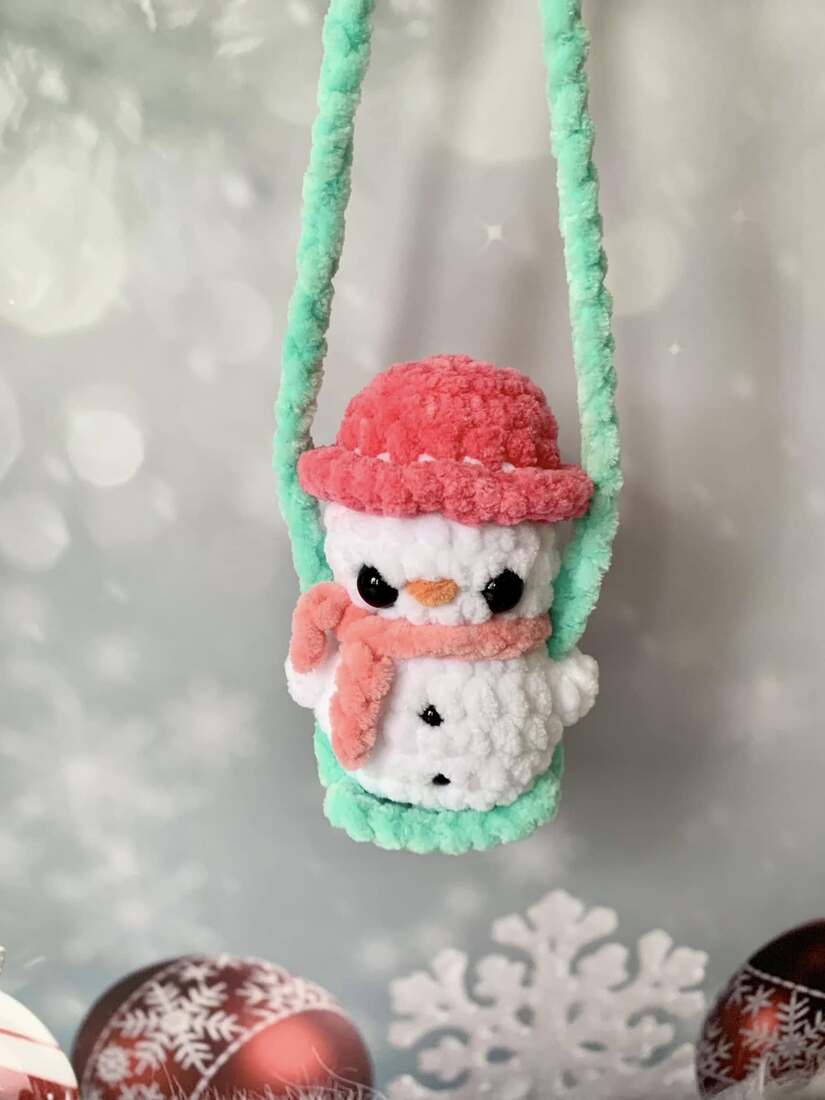 Bonhomme de neige sur balançoire Les mailles calines