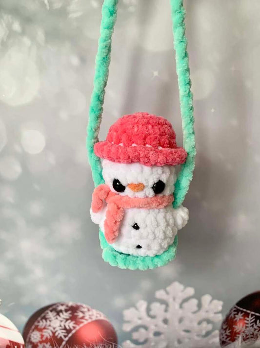 Bonhomme de neige sur balançoire Les mailles calines